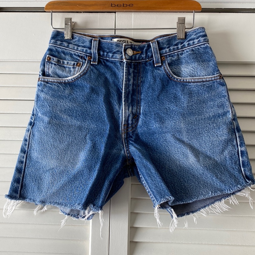 Levi’s 505 denim cut off shorts. Great wash and fit. Would best fit size 26-28